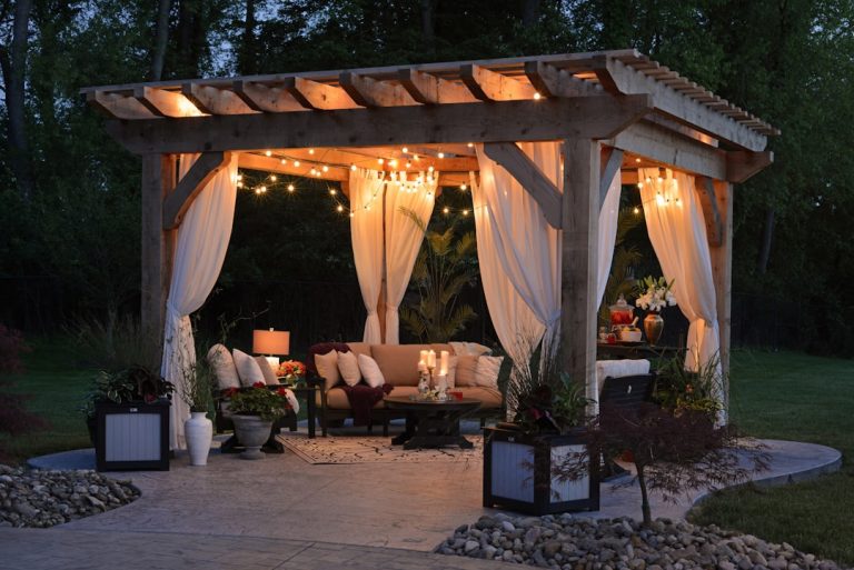 A pergola in a backyard setting